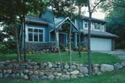 shady front yard with landscaping