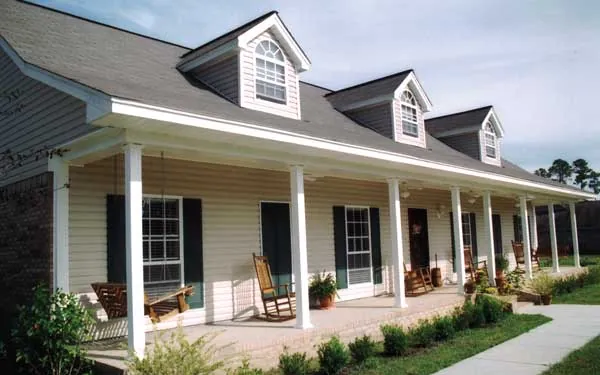 country home with covered front porch