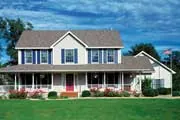 House with American flag on pole