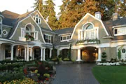 thumbnail of luxury home with window boxes